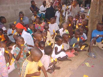 2005 Giving food for orphans in Tanzania (1).jpg